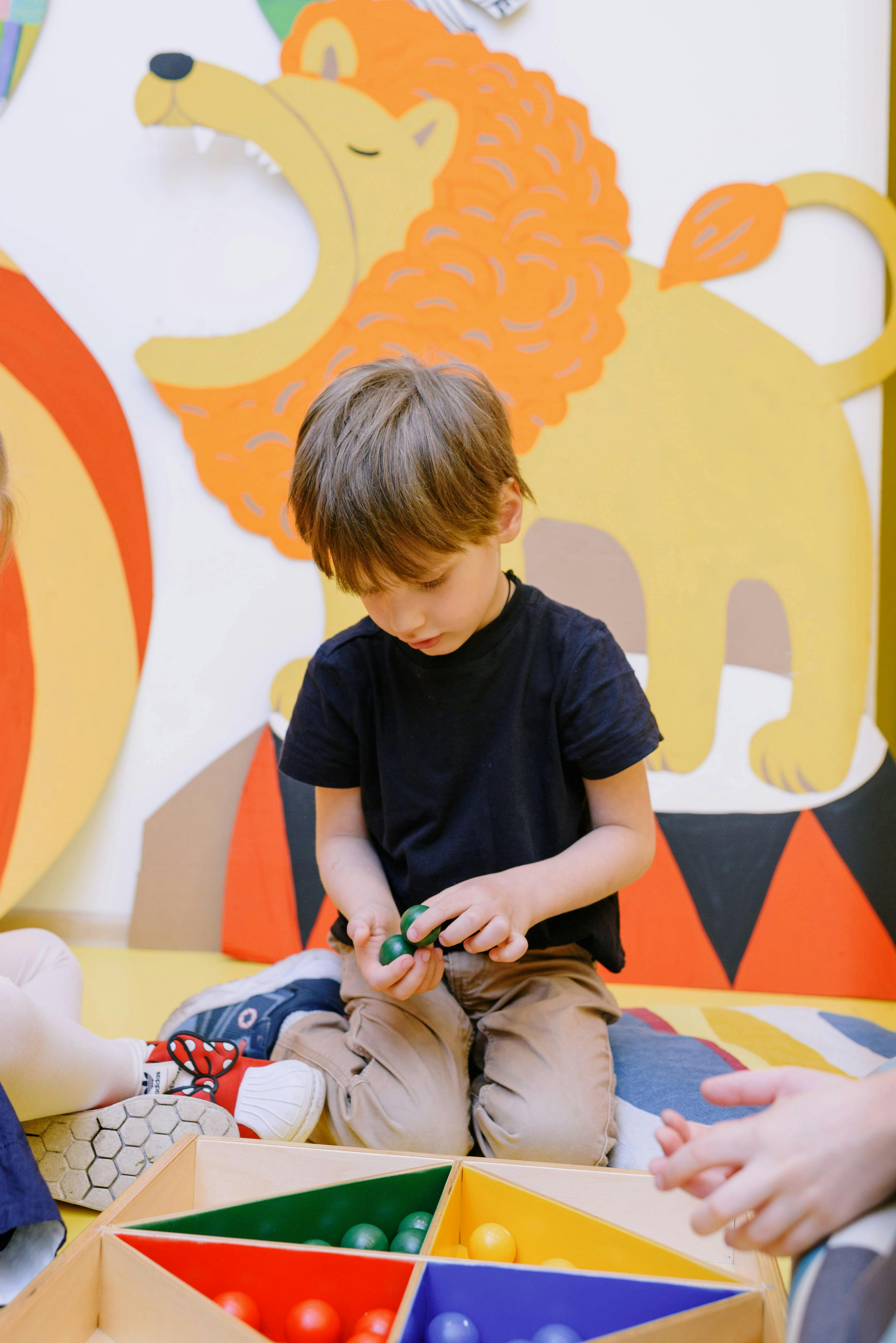 A young child absorbed in hands-on learning